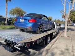 Auto Towing in Santa Ana CA | Red clouds towing