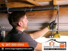 Trouble-Free Garage Door Spring Replacement - EZ Garage Door 